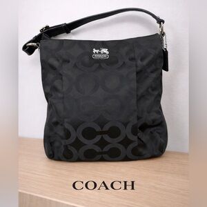 Black Coach Signature Nylon Crossbody / Shoulder Bag
Red interior lining